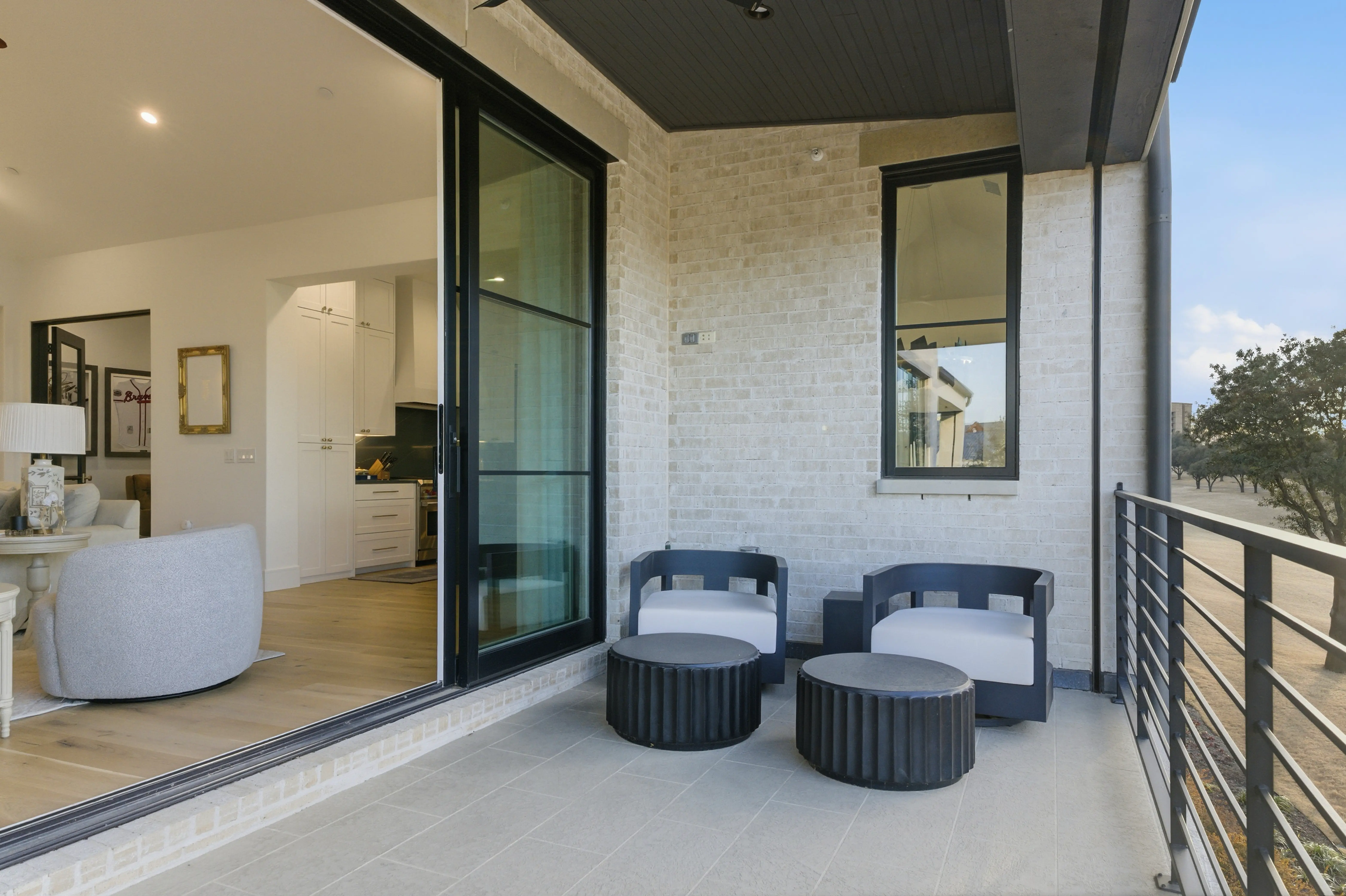 Private balcony with seating overlooking the golf course