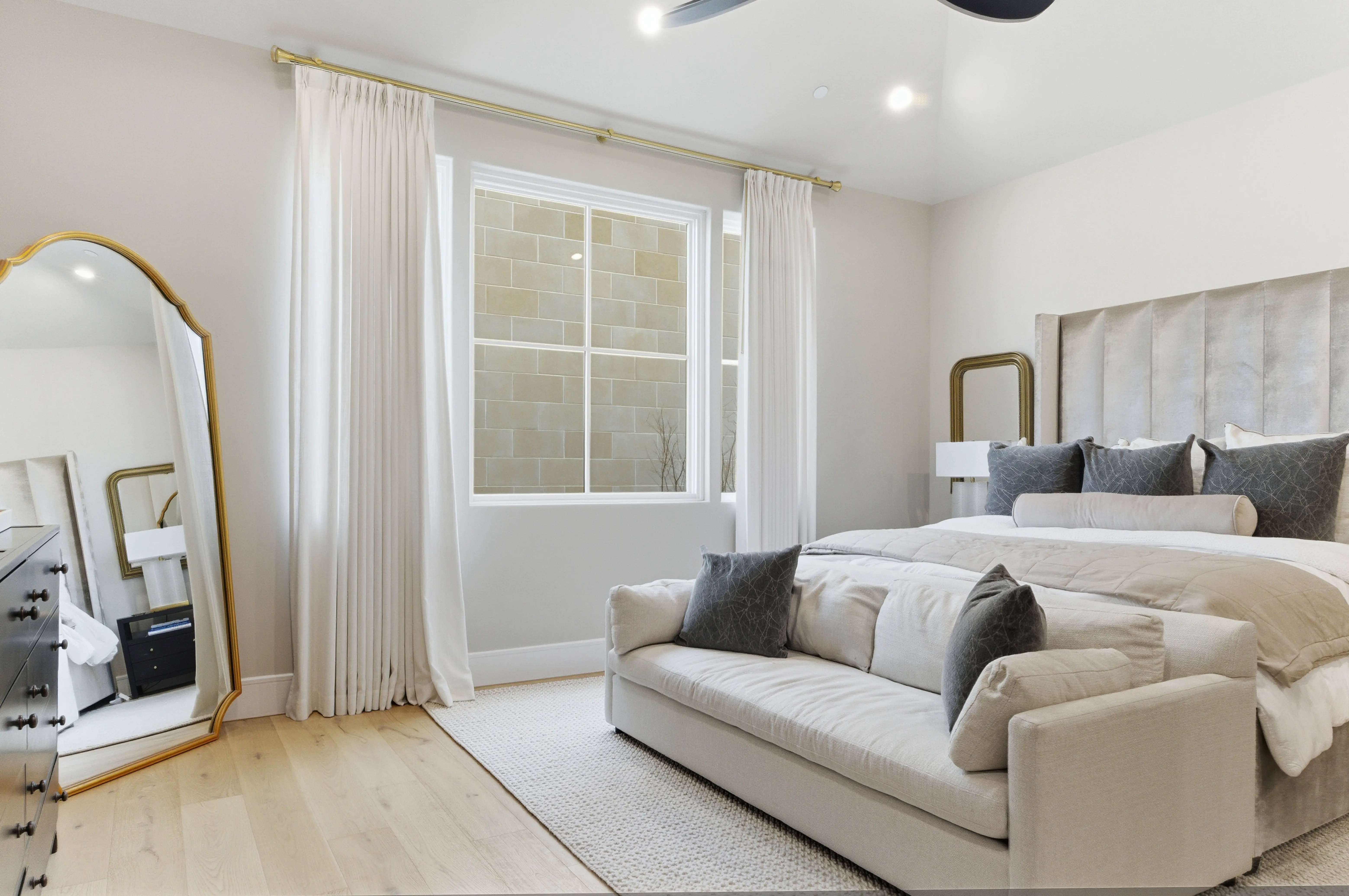 Primary suite with sitting area and designer finishes