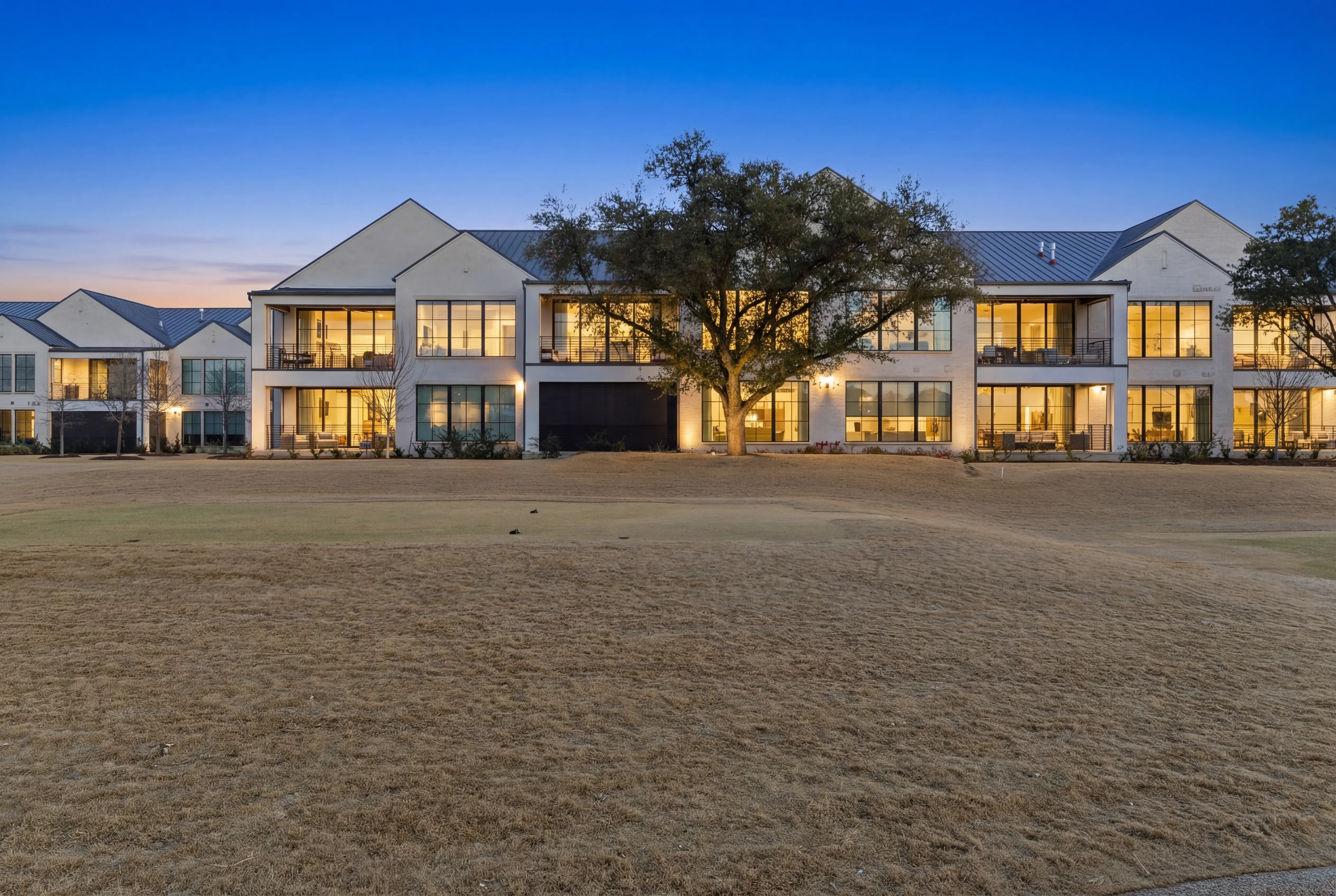 The Residences building exterior at twilight from the Nelson Golf Course