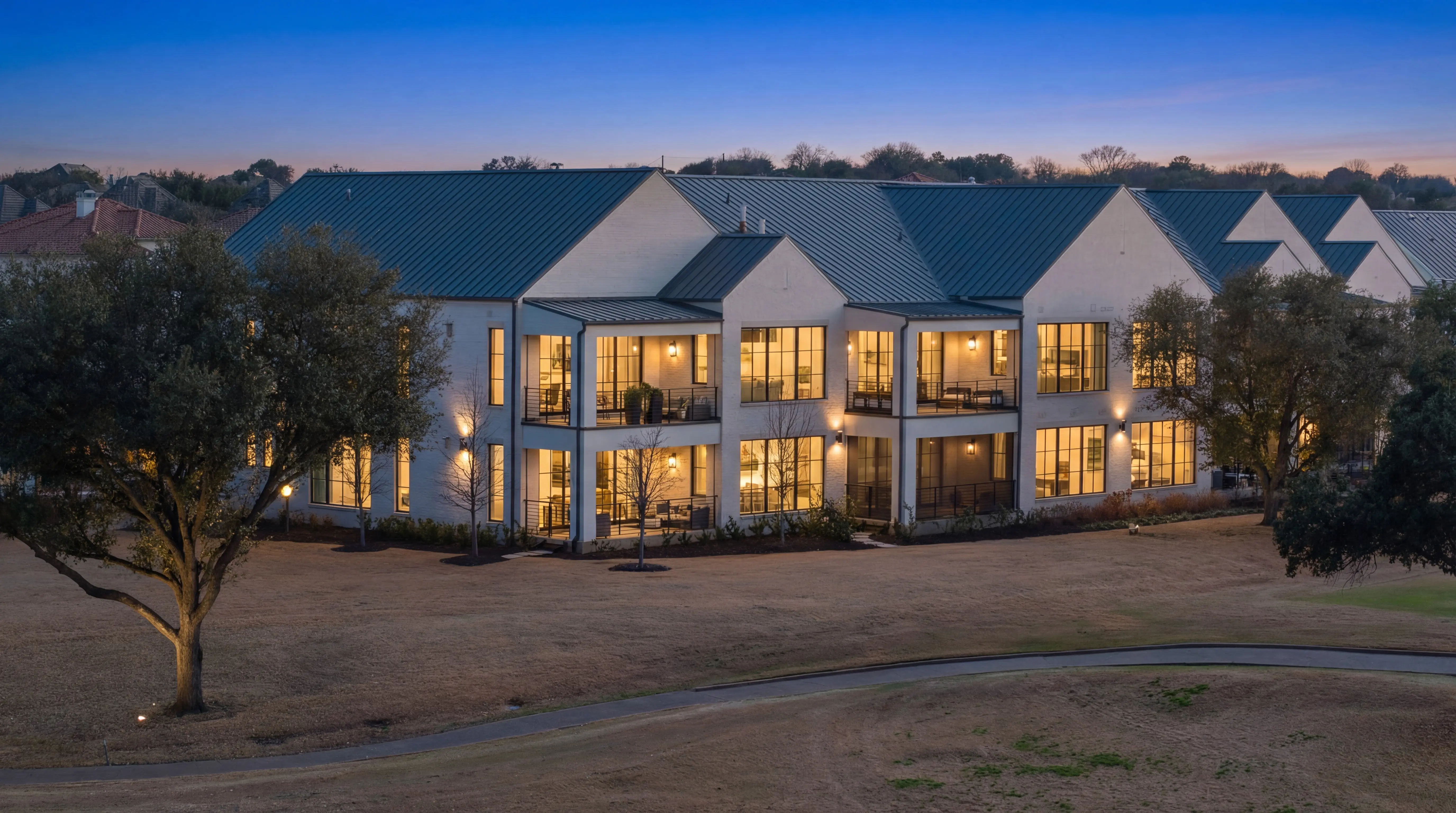 The Residences Villa 3 front elevation at twilight